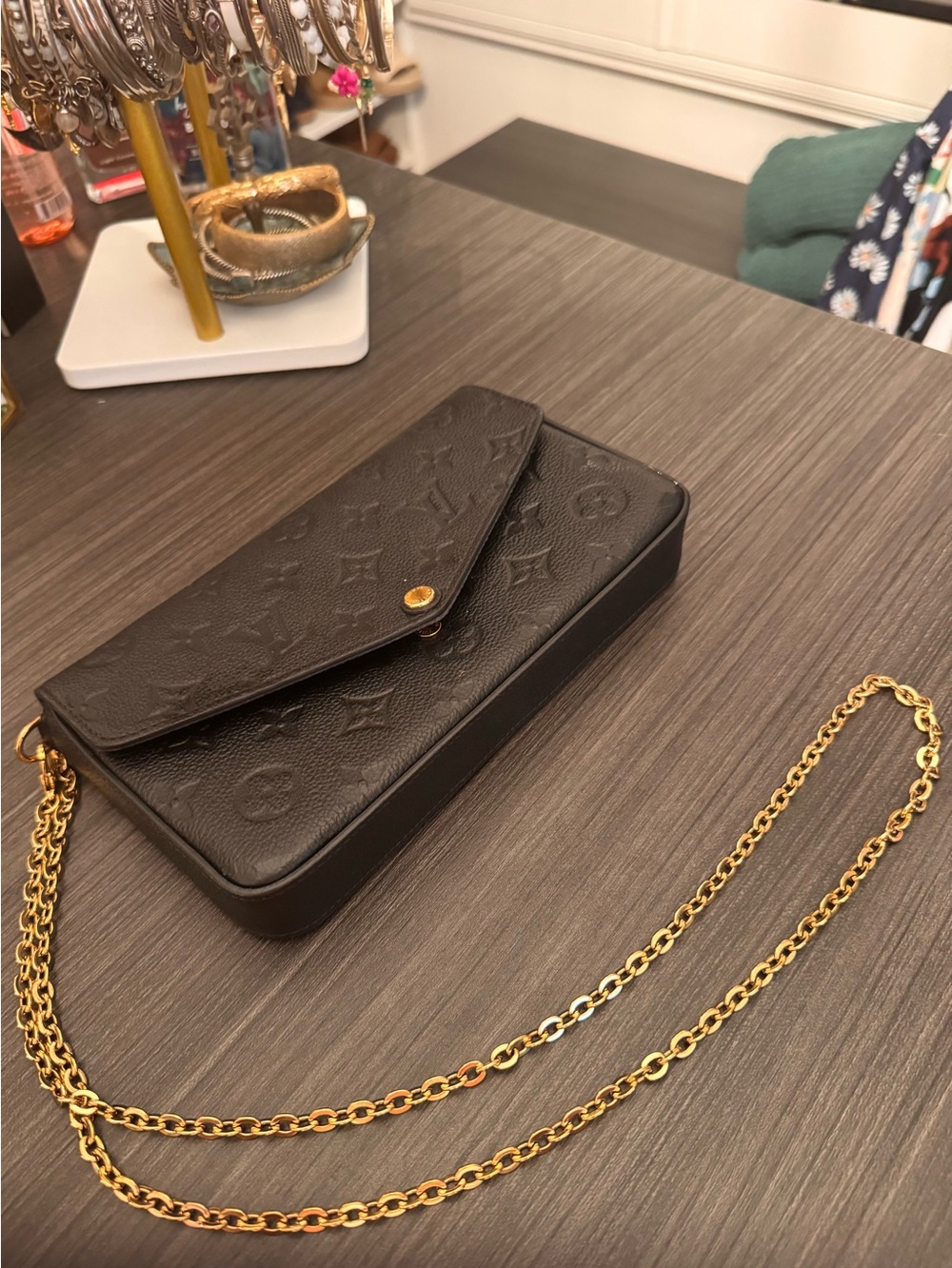 Louis Vuitton Félicie Pochette in black Monogram Empreinte leather w/gold chain